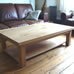 Coffee table in Oak with solid shelf